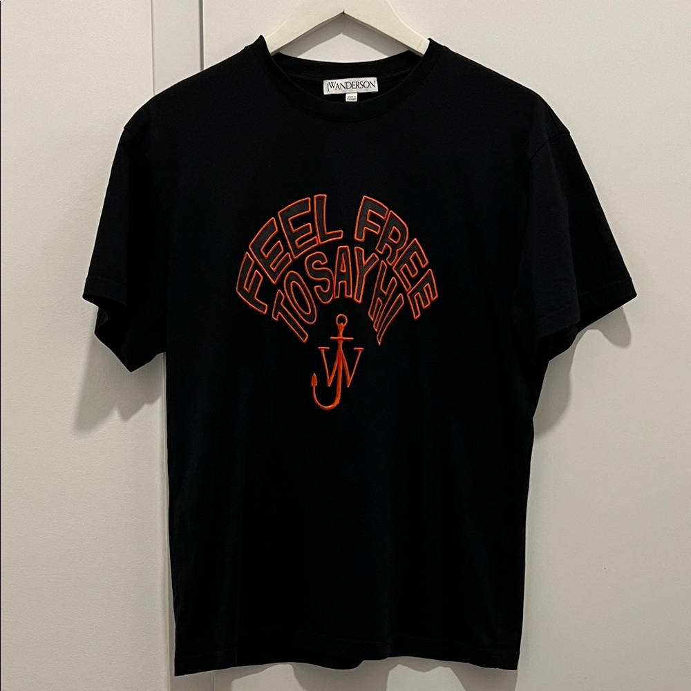 JW Anderson Black Tee with Vibrant Orange Graphic